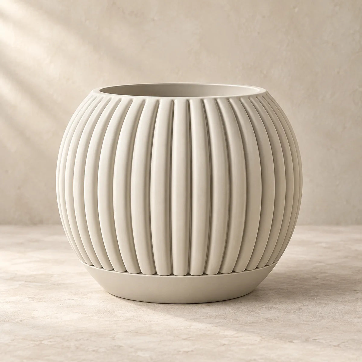 Ribbed round planter on legs